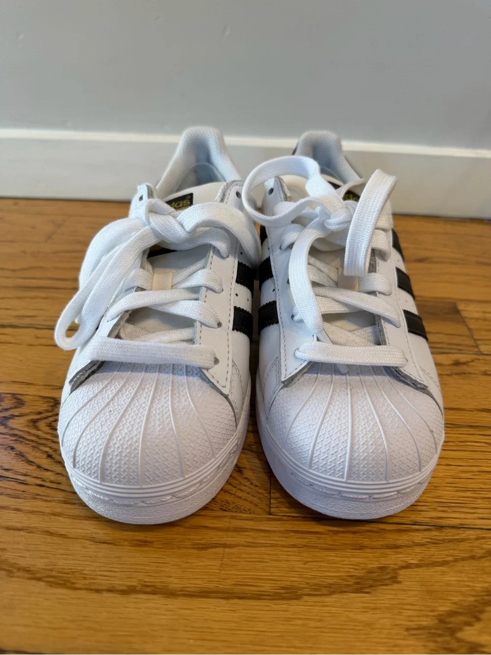 adidas Men’s White Superstar ADV Shoes with Black Stripes